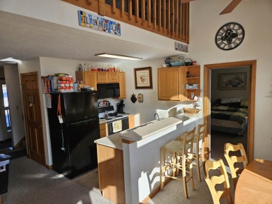 Check out this 3 bedroom, 2 and half bath year round getaway in on Jack O Lantern Resort in New Hampshire - for sale on GolfHomes.com, golf home, golf lot