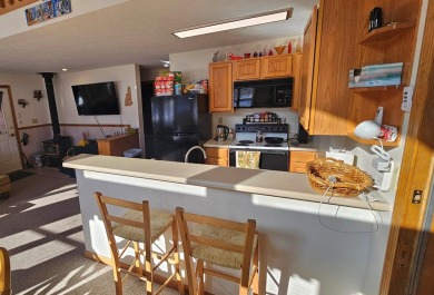 Check out this 3 bedroom, 2 and half bath year round getaway in on Jack O Lantern Resort in New Hampshire - for sale on GolfHomes.com, golf home, golf lot