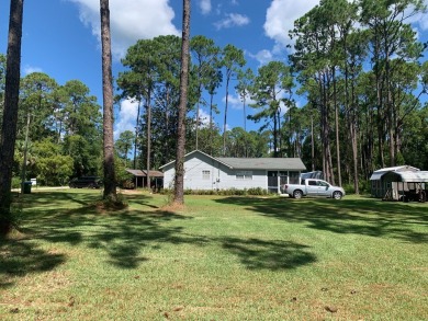 TREMENDOUS PRICE IMPROVEMENT! Your boat could be home. Have you on St. James Bay in Florida - for sale on GolfHomes.com, golf home, golf lot