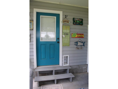 TREMENDOUS PRICE IMPROVEMENT! Your boat could be home. Have you on St. James Bay in Florida - for sale on GolfHomes.com, golf home, golf lot