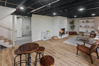 Welcome to this updated 5-bedroom 3-bath multi-level home with a on Tamarack Country Club in Illinois - for sale on GolfHomes.com, golf home, golf lot