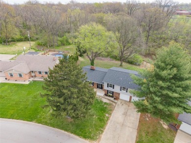 Welcome to this updated 5-bedroom 3-bath multi-level home with a on Tamarack Country Club in Illinois - for sale on GolfHomes.com, golf home, golf lot