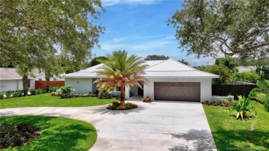 Welcome to this highly desirable home in the Village of Tequesta on Tequesta Country Club in Florida - for sale on GolfHomes.com, golf home, golf lot