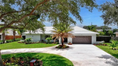 Welcome to this highly desirable home in the Village of Tequesta on Tequesta Country Club in Florida - for sale on GolfHomes.com, golf home, golf lot