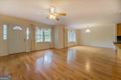 Year-round big water views of Jackson Lake!! This 3-bedroom & 2 on Turtle Cove Golf Course in Georgia - for sale on GolfHomes.com, golf home, golf lot
