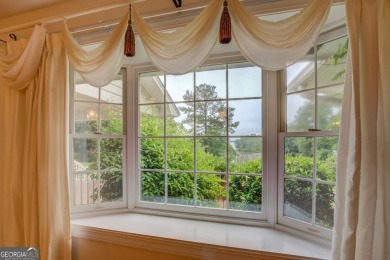 Year-round big water views of Jackson Lake!! This 3-bedroom & 2 on Turtle Cove Golf Course in Georgia - for sale on GolfHomes.com, golf home, golf lot