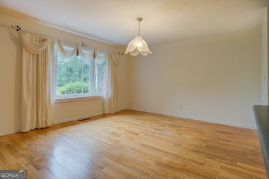 Year-round big water views of Jackson Lake!! This 3-bedroom & 2 on Turtle Cove Golf Course in Georgia - for sale on GolfHomes.com, golf home, golf lot