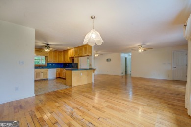 Year-round big water views of Jackson Lake!! This 3-bedroom & 2 on Turtle Cove Golf Course in Georgia - for sale on GolfHomes.com, golf home, golf lot
