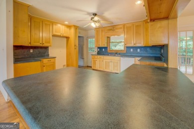 Year-round big water views of Jackson Lake!! This 3-bedroom & 2 on Turtle Cove Golf Course in Georgia - for sale on GolfHomes.com, golf home, golf lot