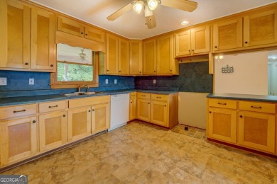 Year-round big water views of Jackson Lake!! This 3-bedroom & 2 on Turtle Cove Golf Course in Georgia - for sale on GolfHomes.com, golf home, golf lot