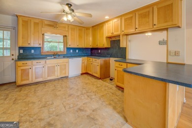 Year-round big water views of Jackson Lake!! This 3-bedroom & 2 on Turtle Cove Golf Course in Georgia - for sale on GolfHomes.com, golf home, golf lot