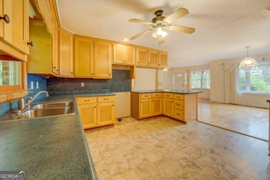 Year-round big water views of Jackson Lake!! This 3-bedroom & 2 on Turtle Cove Golf Course in Georgia - for sale on GolfHomes.com, golf home, golf lot