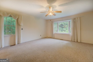 Year-round big water views of Jackson Lake!! This 3-bedroom & 2 on Turtle Cove Golf Course in Georgia - for sale on GolfHomes.com, golf home, golf lot