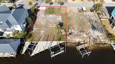 Check out this Canalfront lot with 2 NEWLY BUILT BOAT SLIPS! on  in Florida - for sale on GolfHomes.com, golf home, golf lot