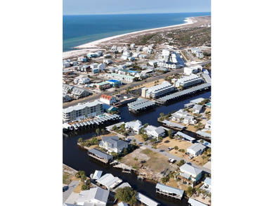 Check out this Canalfront lot with 2 NEWLY BUILT BOAT SLIPS! on  in Florida - for sale on GolfHomes.com, golf home, golf lot