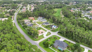 This beautifully designed concrete block stucco home stands out on The Grand Club Cypress Course in Florida - for sale on GolfHomes.com, golf home, golf lot