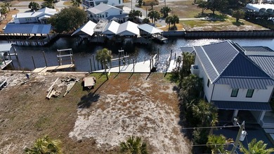 Check out this Canalfront lot with 2 NEWLY BUILT BOAT SLIPS! on  in Florida - for sale on GolfHomes.com, golf home, golf lot