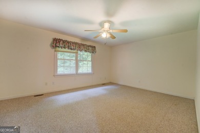 Year-round big water views of Jackson Lake!! This 3-bedroom & 2 on Turtle Cove Golf Course in Georgia - for sale on GolfHomes.com, golf home, golf lot