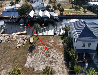 Check out this Canalfront lot with 2 NEWLY BUILT BOAT SLIPS! on  in Florida - for sale on GolfHomes.com, golf home, golf lot