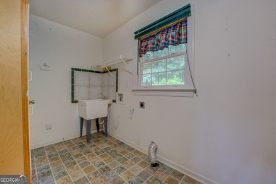 Year-round big water views of Jackson Lake!! This 3-bedroom & 2 on Turtle Cove Golf Course in Georgia - for sale on GolfHomes.com, golf home, golf lot