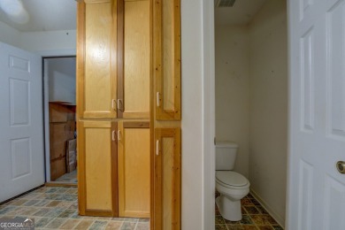 Year-round big water views of Jackson Lake!! This 3-bedroom & 2 on Turtle Cove Golf Course in Georgia - for sale on GolfHomes.com, golf home, golf lot