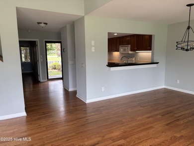 Charming Two-Story Townhome in Olde Point Villas This on Olde Point Golf and Country Club in North Carolina - for sale on GolfHomes.com, golf home, golf lot