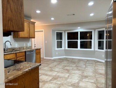 Carefully and beautifully remodeled home with nice location and on The Bridges Golf Club At Hollywood Casino in Mississippi - for sale on GolfHomes.com, golf home, golf lot