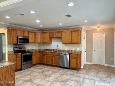 Carefully and beautifully remodeled home with nice location and on The Bridges Golf Club At Hollywood Casino in Mississippi - for sale on GolfHomes.com, golf home, golf lot