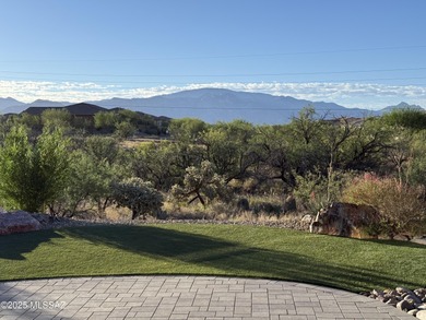 Perched on the edge of lush greenspace with stunning views of Mt on Saddlebrooke Ranch Golf Club in Arizona - for sale on GolfHomes.com, golf home, golf lot
