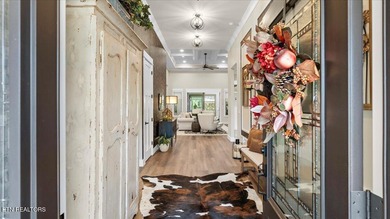 Welcome to 140 Utsesti Way! Discover contemporary elegance and on Toqua Golf Course - Loudon County in Tennessee - for sale on GolfHomes.com, golf home, golf lot