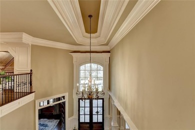 Luxury French Provincial estate located in the prestigious gated on TPC At Sugarloaf Golf Club in Georgia - for sale on GolfHomes.com, golf home, golf lot