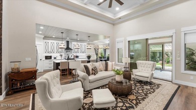 Welcome to 140 Utsesti Way! Discover contemporary elegance and on Toqua Golf Course - Loudon County in Tennessee - for sale on GolfHomes.com, golf home, golf lot