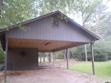 Remarkable 3-2 home situated on three lots, combined for a total on Holly Lake Ranch Golf Club in Texas - for sale on GolfHomes.com, golf home, golf lot
