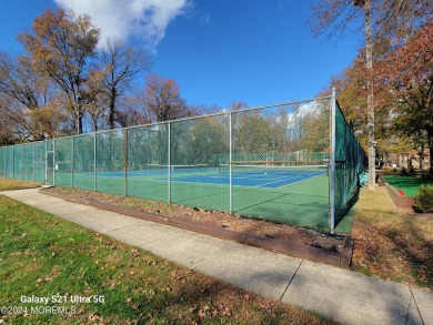 You have to see this amazing, tucked away, quiet 2nd floor home on Pine Brook Golf Course in New Jersey - for sale on GolfHomes.com, golf home, golf lot