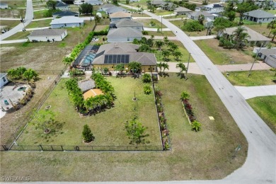 Your Private Tropical Oasis with Pool, Spa, Tiki Hut & Extra Lot on Del Tura Golf and Country Club in Florida - for sale on GolfHomes.com, golf home, golf lot