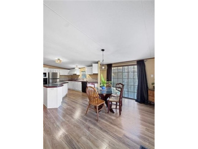 Welcome to this beautifully updated double wide mobile home on Diamondhead Country Club in Mississippi - for sale on GolfHomes.com, golf home, golf lot