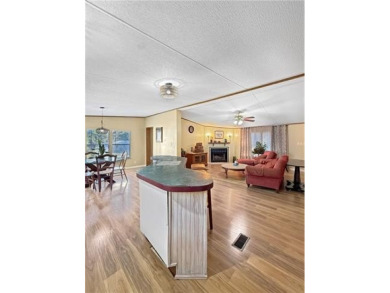 Welcome to this beautifully updated double wide mobile home on Diamondhead Country Club in Mississippi - for sale on GolfHomes.com, golf home, golf lot