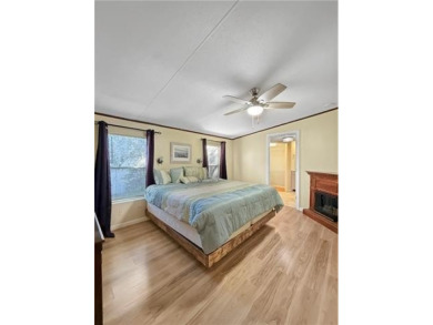 Welcome to this beautifully updated double wide mobile home on Diamondhead Country Club in Mississippi - for sale on GolfHomes.com, golf home, golf lot