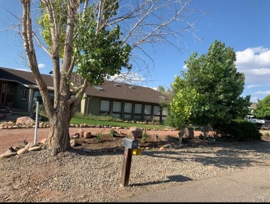 An extraordinary 5-bedroom, 6-bathroom unique tri-level home on Desert Hawk At Pueblo West in Colorado - for sale on GolfHomes.com, golf home, golf lot