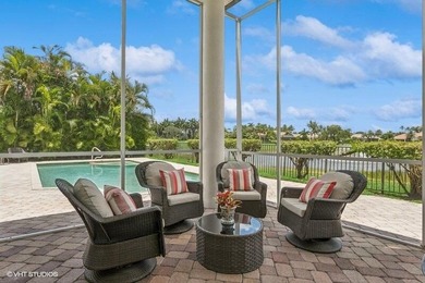 CUSTOM ESTATE HOME WITH 4BR PLUS OFFICE/4.1 BATHS LOCATED ON A on  in Florida - for sale on GolfHomes.com, golf home, golf lot