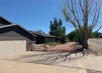 An extraordinary 5-bedroom, 6-bathroom unique tri-level home on Desert Hawk At Pueblo West in Colorado - for sale on GolfHomes.com, golf home, golf lot