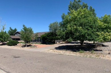 An extraordinary 5-bedroom, 6-bathroom unique tri-level home on Desert Hawk At Pueblo West in Colorado - for sale on GolfHomes.com, golf home, golf lot