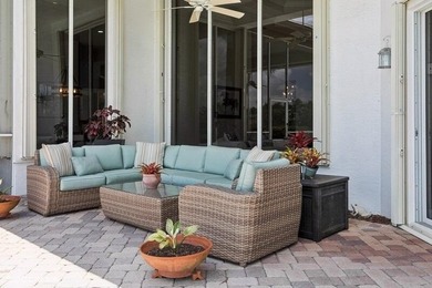 CUSTOM ESTATE HOME WITH 4BR PLUS OFFICE/4.1 BATHS LOCATED ON A on  in Florida - for sale on GolfHomes.com, golf home, golf lot