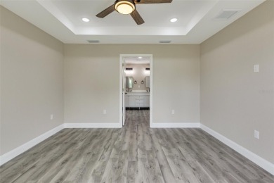 One or more photo(s) has been virtually staged. NEW CONSTRUCTION on Rotonda Golf and Country Club - Long Marsh  in Florida - for sale on GolfHomes.com, golf home, golf lot