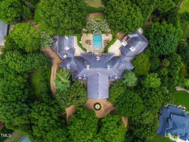 The famous Painter House! A gorgeous estate sprawling over 1.8 on North Ridge Country Club in North Carolina - for sale on GolfHomes.com, golf home, golf lot