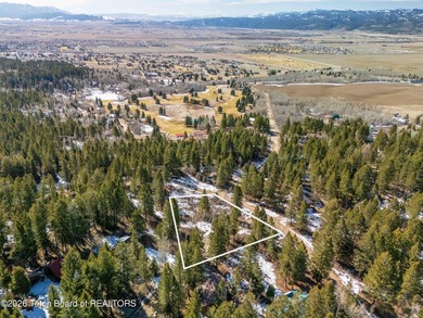 Positioned on a prime corner lot just north of the Aspen Hills on Star Valley RV Golf Course in Wyoming - for sale on GolfHomes.com, golf home, golf lot