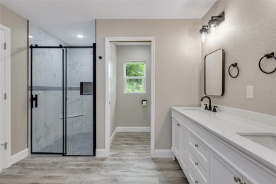 One or more photo(s) has been virtually staged. NEW CONSTRUCTION on Rotonda Golf and Country Club - Long Marsh  in Florida - for sale on GolfHomes.com, golf home, golf lot