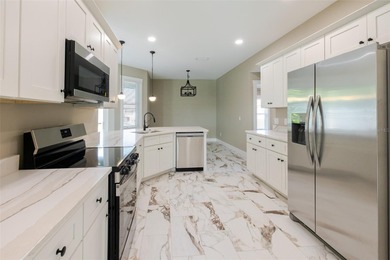 One or more photos have been virtually staged.  NEW CONSTRUCTION on Oyster Creek Golf Club in Florida - for sale on GolfHomes.com, golf home, golf lot