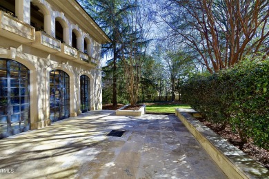 The famous Painter House! A gorgeous estate sprawling over 1.8 on North Ridge Country Club in North Carolina - for sale on GolfHomes.com, golf home, golf lot