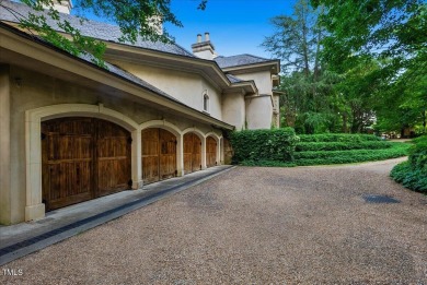 The famous Painter House! A gorgeous estate sprawling over 1.8 on North Ridge Country Club in North Carolina - for sale on GolfHomes.com, golf home, golf lot